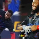 Vladimir Guerrero Jr. muestra gestos de dolor durante un partido de los Toronto Blue Jays tras recibir un fuerte golpe accidental en la cabeza.