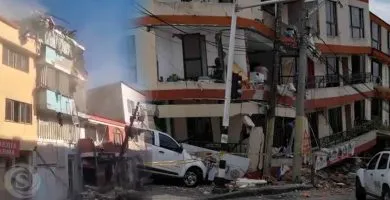 Edificio de varios niveles con daños estructurales y escombros en una calle tras el fuerte terremoto registrado en Ayacucho, Perú.