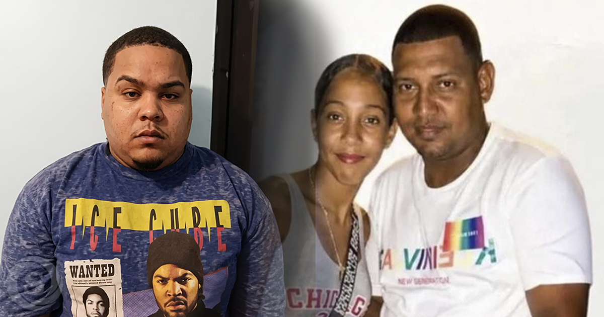 Carlos José Troche, conocido como Nino Dollar, junto a una fotografía de Wilmer Rodríguez y su hija Wilkaren, víctimas de un accidente de tránsito en Santo Domingo.